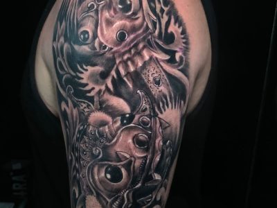 Balinese Culture-Inspired Tattoos: Barong, Rangda, Lotus, and Ocean Waves